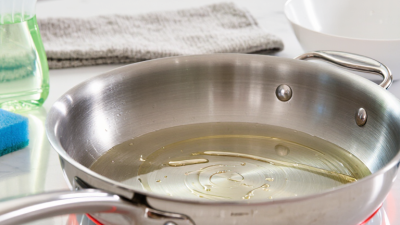 How to Get Oil Stains Off a Stainless Steel Pan?