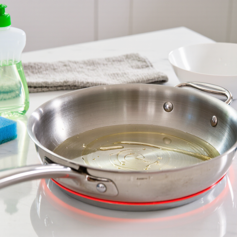 How to Get Oil Stains Off a Stainless Steel Pan?