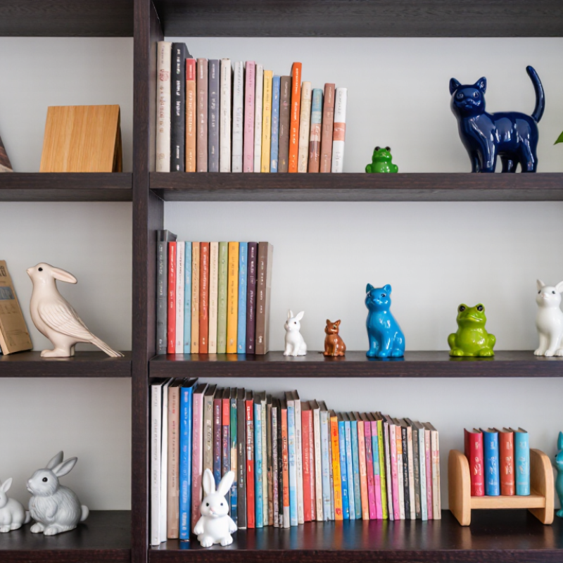 7 Tips for Arranging Small Ceramic Figurines on a Bookshelf
